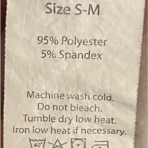 Women’s top. Has sparked butterfly on front